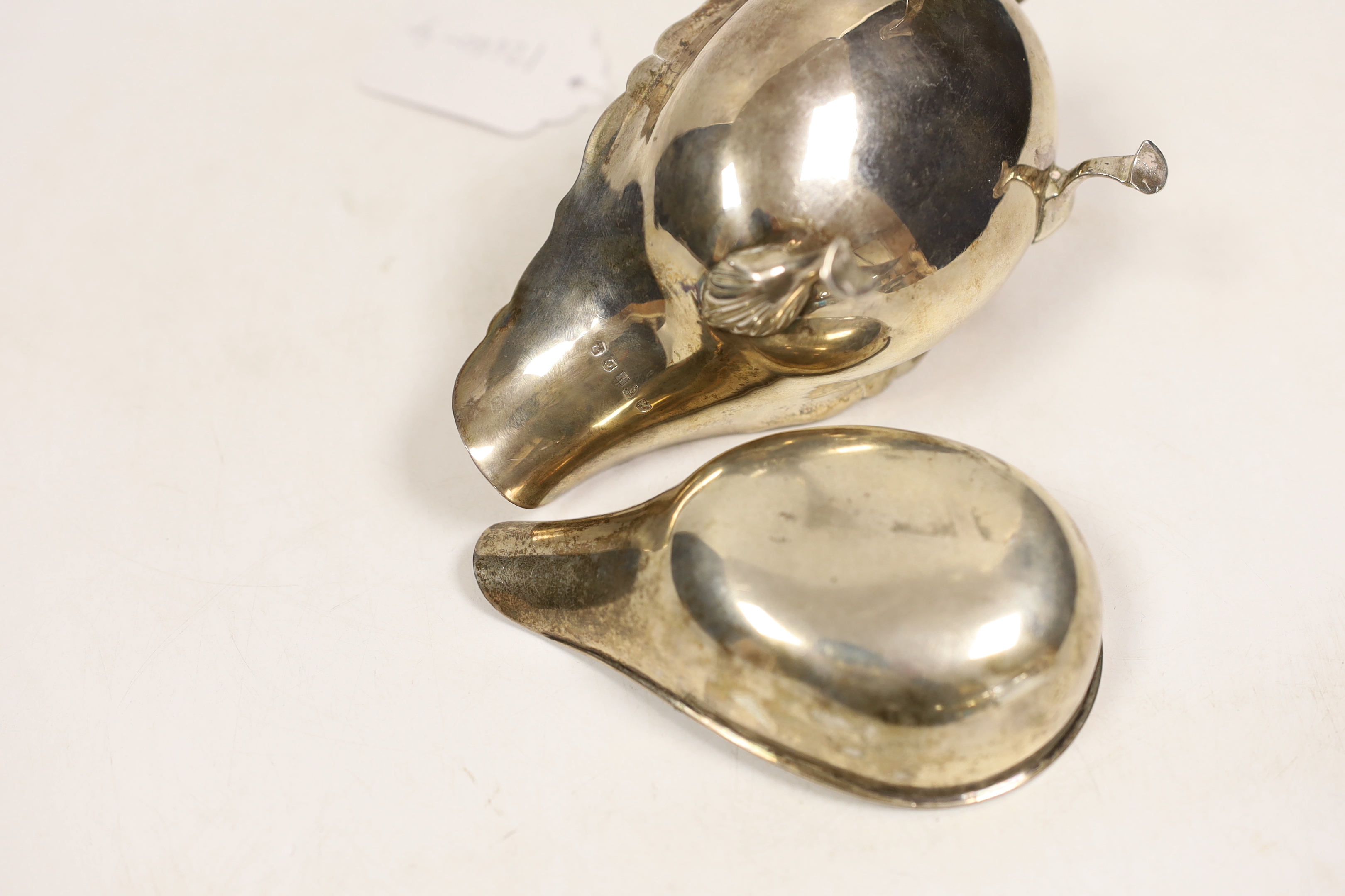 A George III silver sauceboat, by Peter, Ann & William Bateman, London, 1802, length 14.5cm (splits) and a George III silver pap boat, London, 1791.